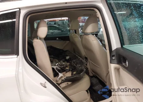 2012 Volkswagen Tiguan Sel z USA, uszkodzony, nr VIN WVGBV7AX0CW548611